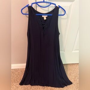 Short, sleeveless, tie front Loft dress in navy blue.